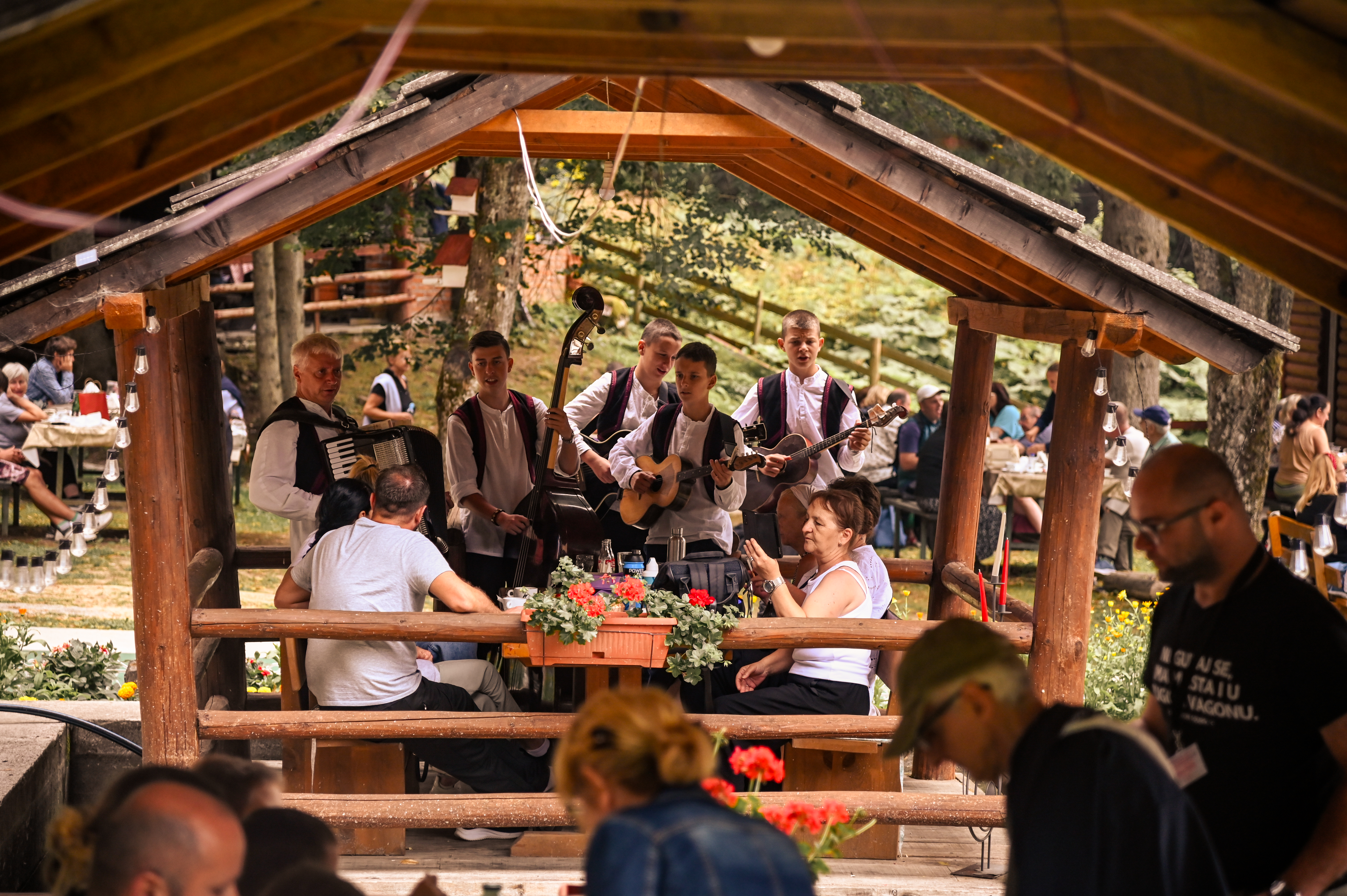 Guests gathered beside the train during a Blossom Tours company retreat experience